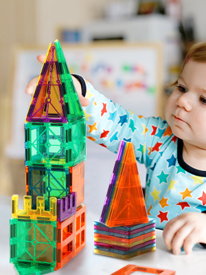 Children Playing With Magnetic Toys